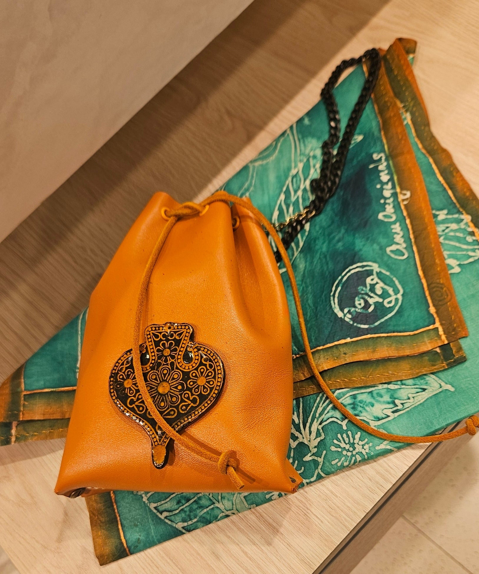 Leather Bucket Bag in Burnt Orange with embellishment | Handcrafted Leather Bag Collection