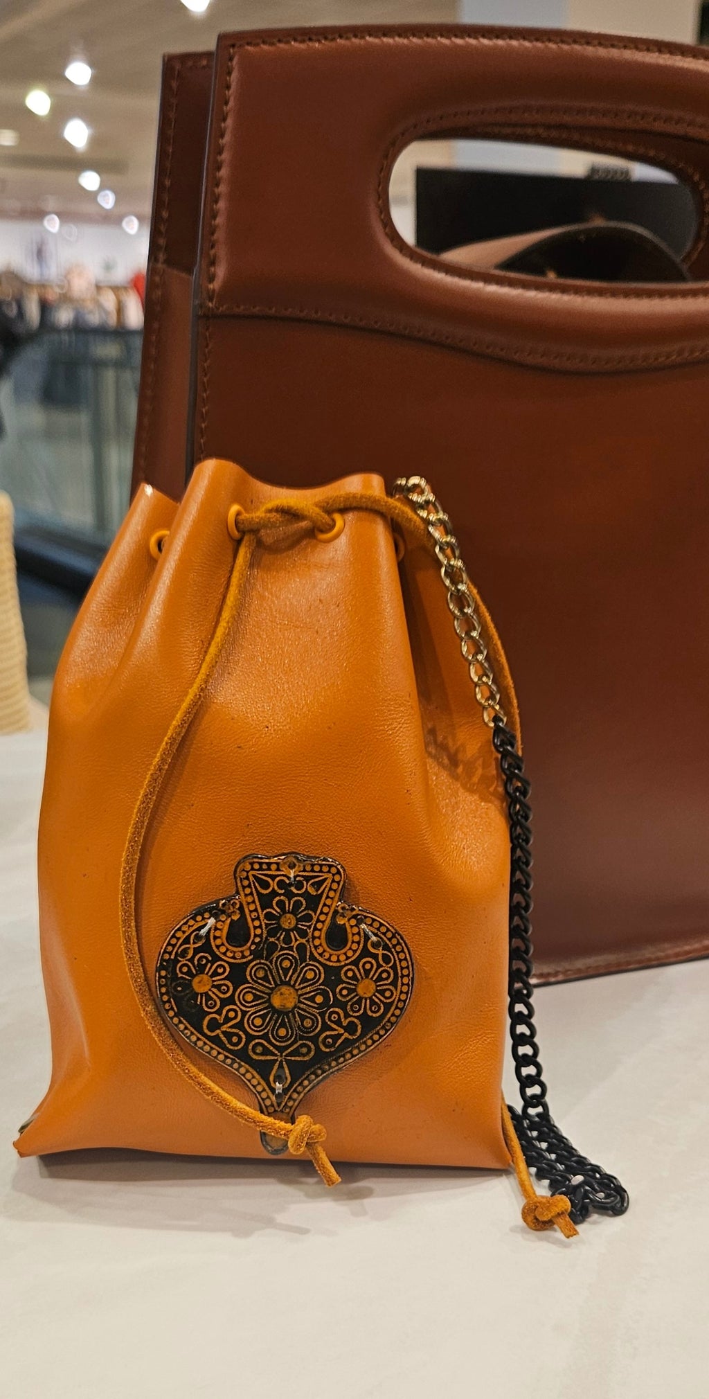 Leather Bucket Bag in Burnt Orange with embellishment | Handcrafted Leather Bag Collection