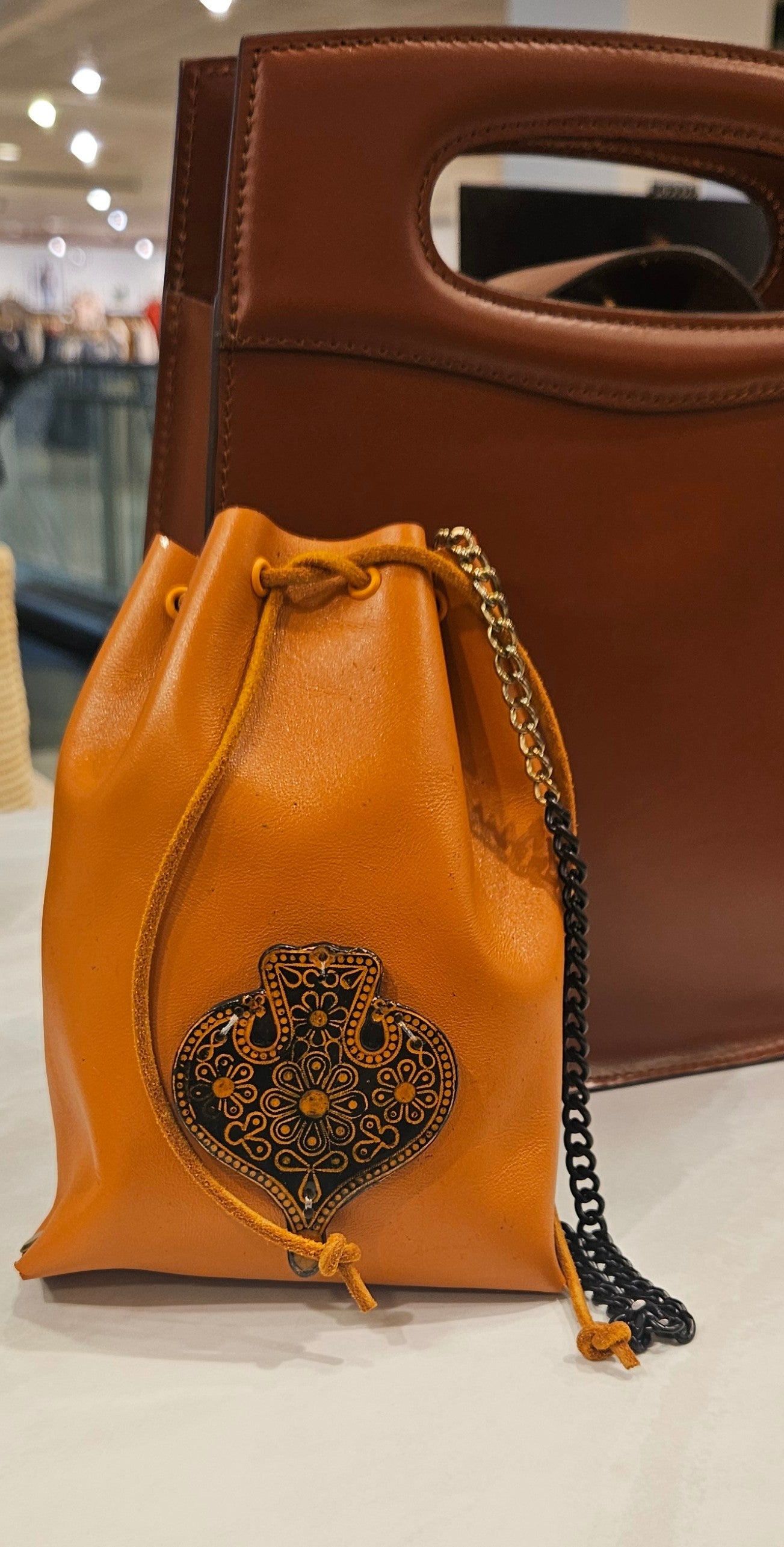 Leather Bucket Bag in Burnt Orange with embellishment | Handcrafted Leather Bag Collection